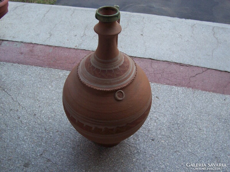 Marked red peter jar is large