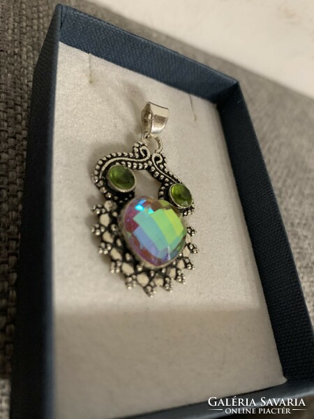 Huge silver pendant with rainbow stone