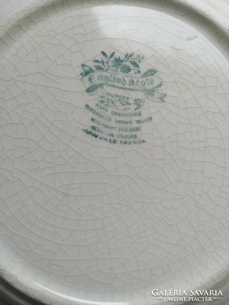 French faience plate with an underglaze rose pattern