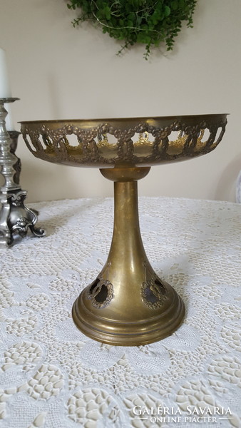 Old brass center table with openwork rim