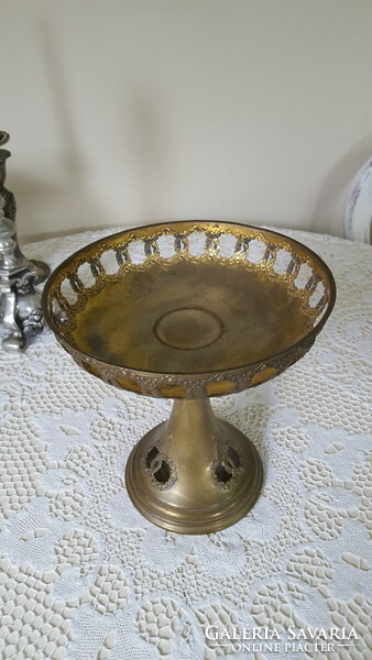 Old brass center table with openwork rim