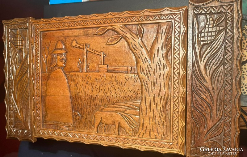 Ethnographic box with a carved scene