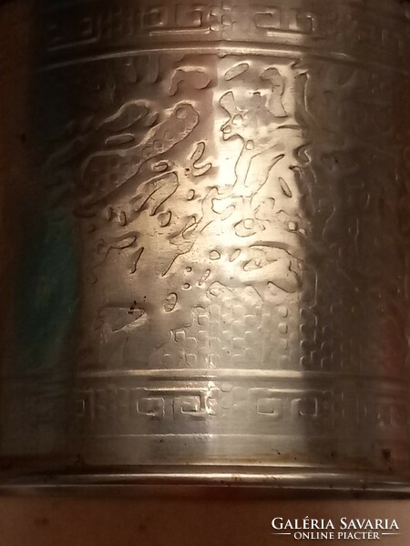 Some kind of metal jar (tea?)