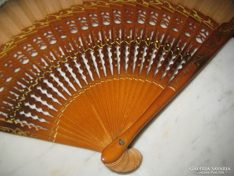 A fan, a beautiful, showy oriental object