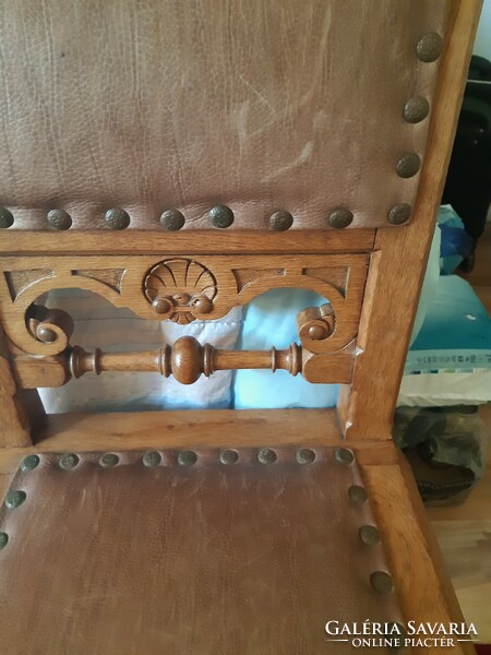 Antique chair with leather upholstery