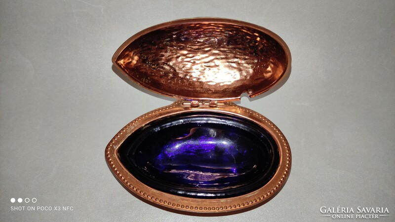 Metal butter or caviar holder with a shiny colored glass insert