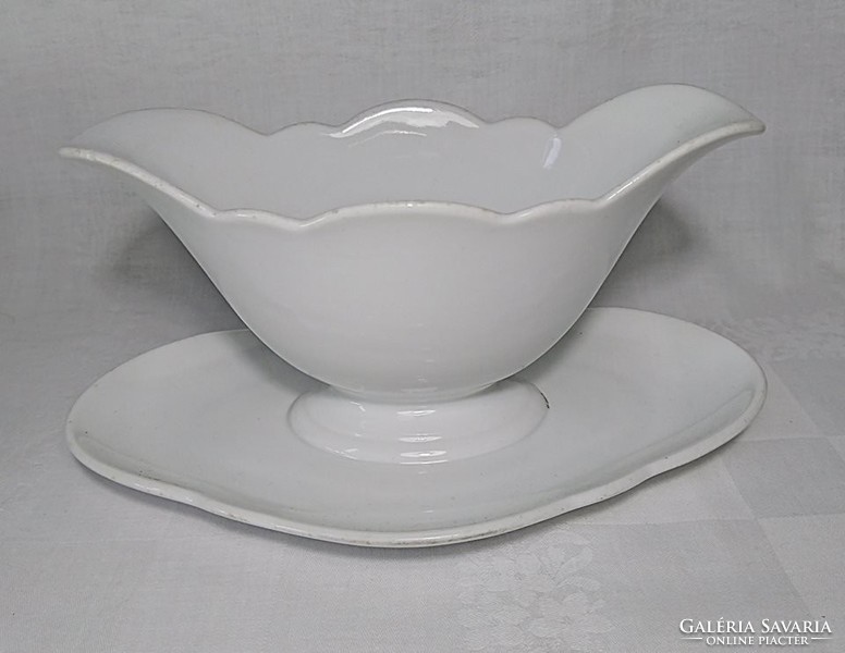 Bone porcelain with a special wavy rim and white saucer base