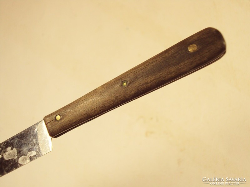 Old kitchen knife with wooden handle