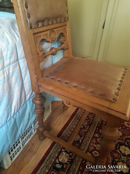 Antique chair with leather upholstery