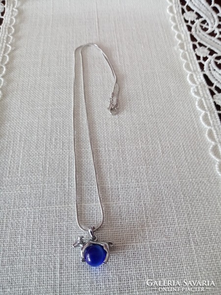 New silver plated necklace with dog pendant -- rotating blue cat's eye stone