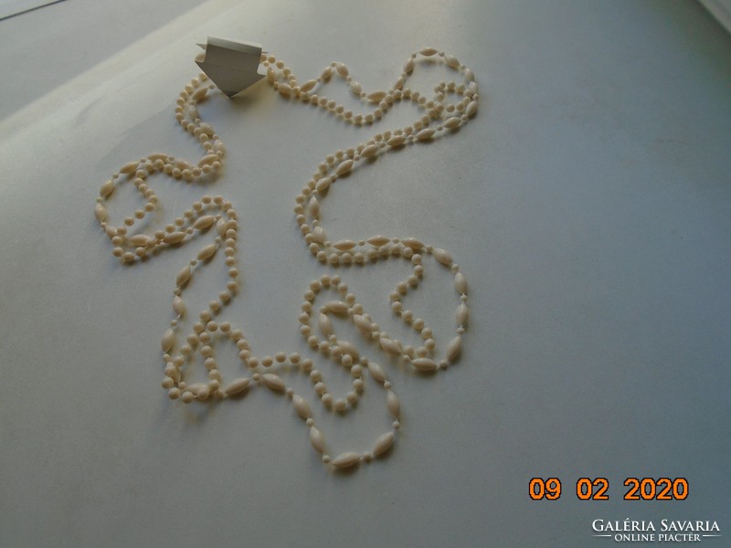 White, long, 2-row necklace of elongated and round pearls