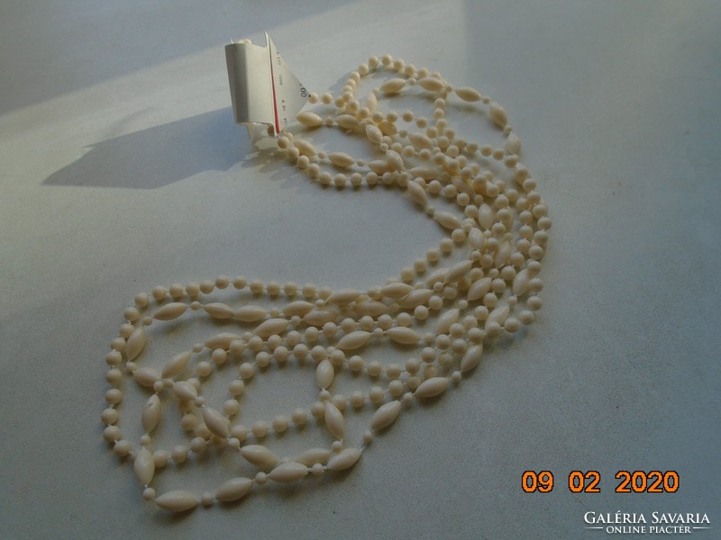 White, long, 2-row necklace of elongated and round pearls
