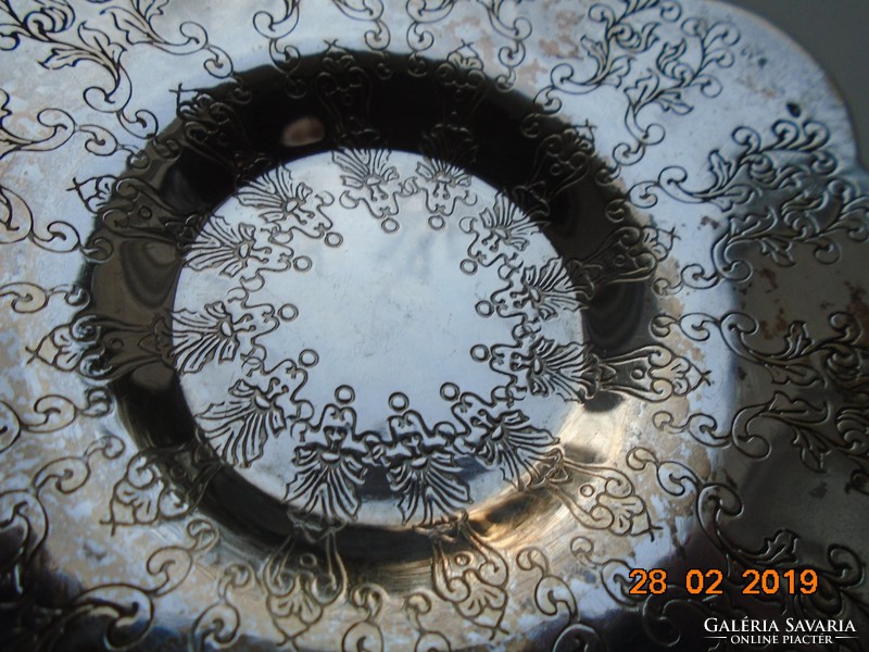 Chiseled with stylized plant patterns, wavy edge, silver-plated bowl