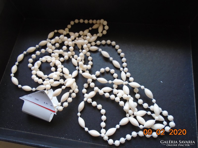 White, long, 2-row necklace of elongated and round pearls