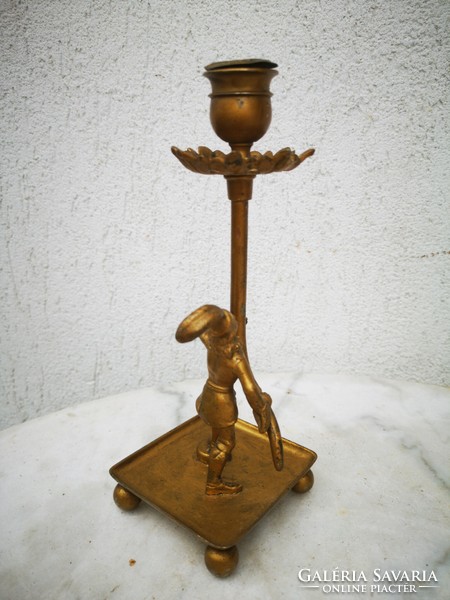 Antique candle holder sculptural, noble soldier figure made of metal. Statue