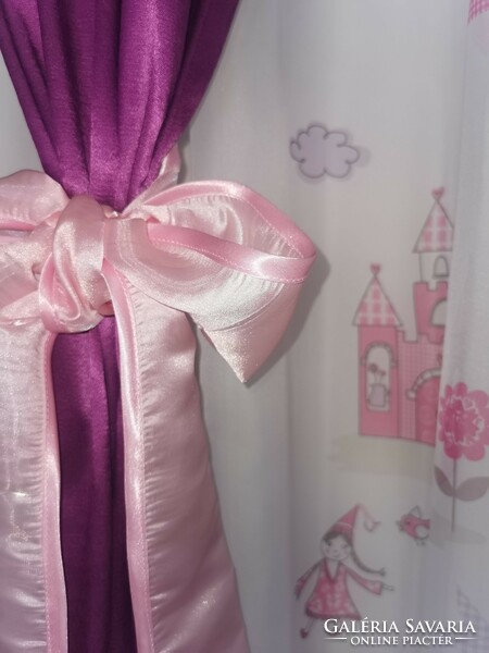 The beautiful curtain set for the little girl's room with a blackout is also new