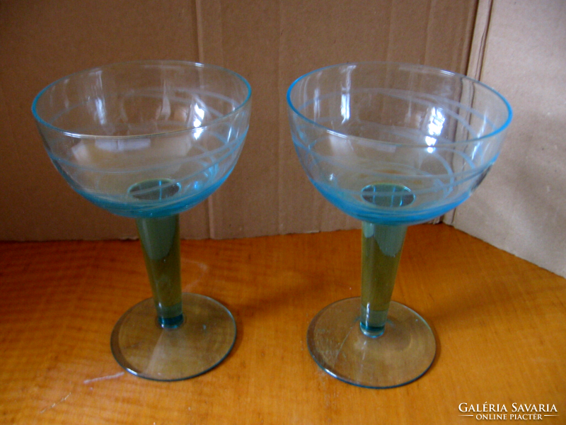 A pair of sky blue stemmed cocktail and champagne glasses with turquoise stems, ikea handmade quality also for weddings