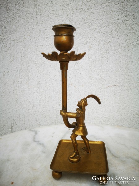Antique candle holder sculptural, noble soldier figure made of metal. Statue