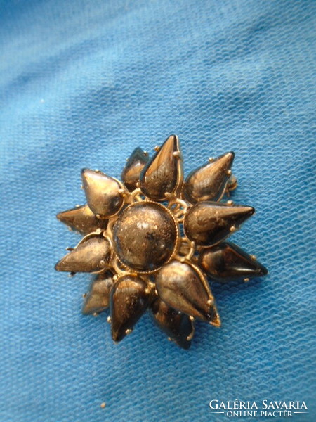 Old brooch with semi-precious stones