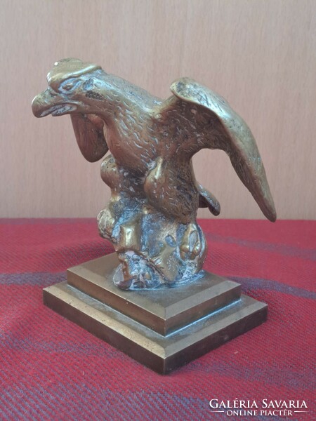 Copper eagle on copper pedestal