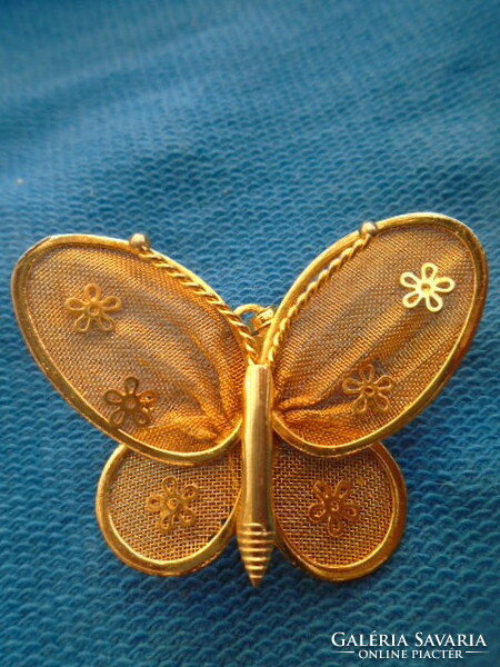 An old brooch and also a pendant is a very beautiful real piece of jewelry