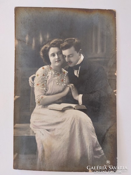 Romantic couple with old postcard photo postcard