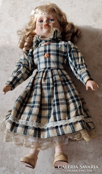Old 42cm high numbered porcelain eyelash doll with hat