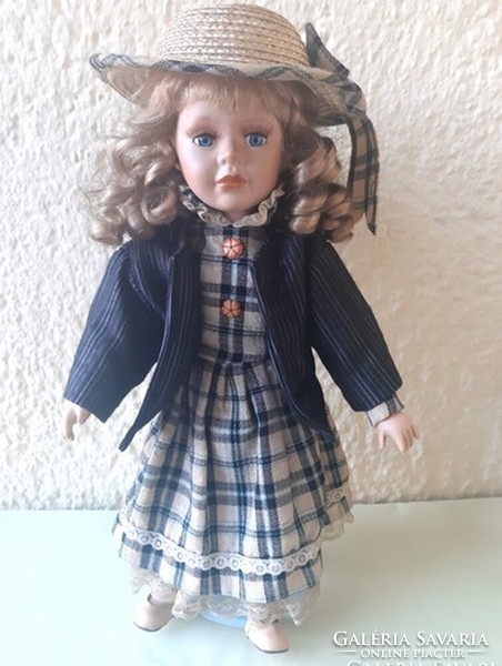 Old 42cm high numbered porcelain eyelash doll with hat