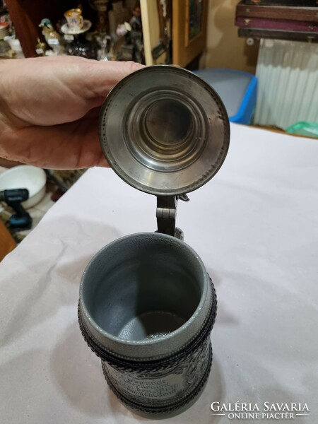 Old pewter cup with lid