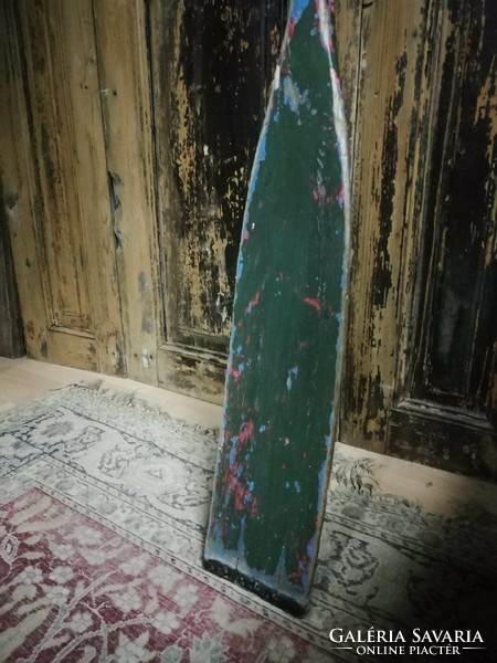 Oar, dark green old wooden oar for sale as decoration.