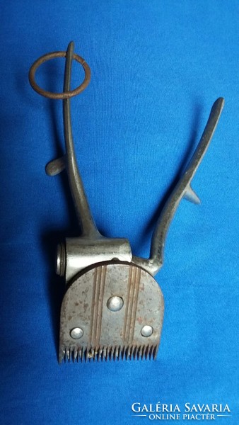 Old marked metal hand clipper