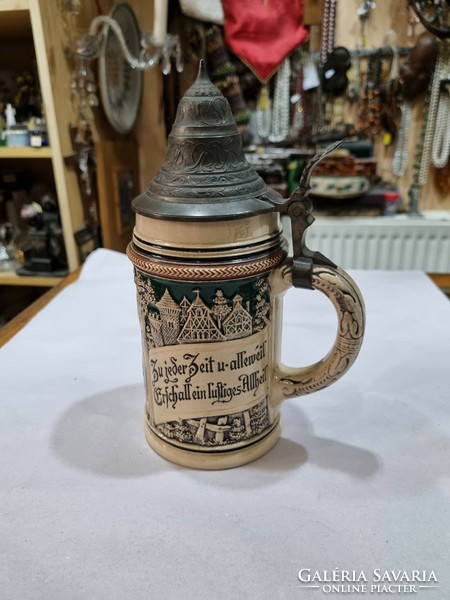 Old pewter cup with lid