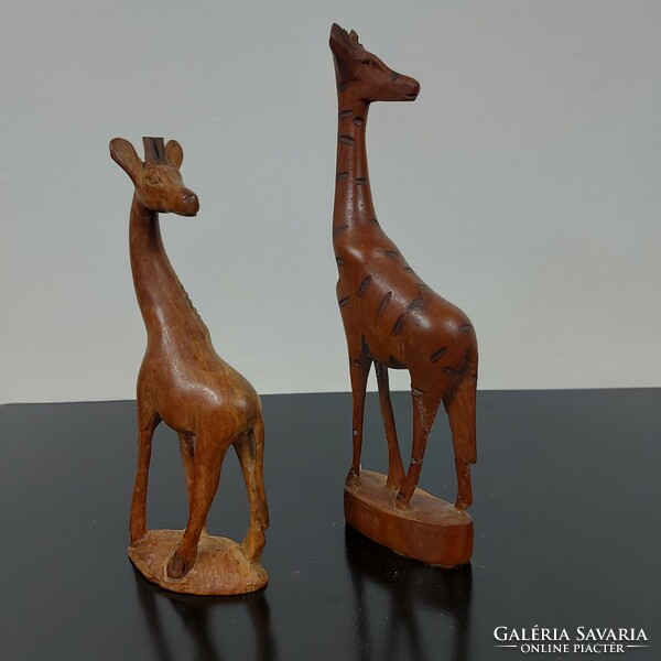 Giraffe sculpture carved from wood