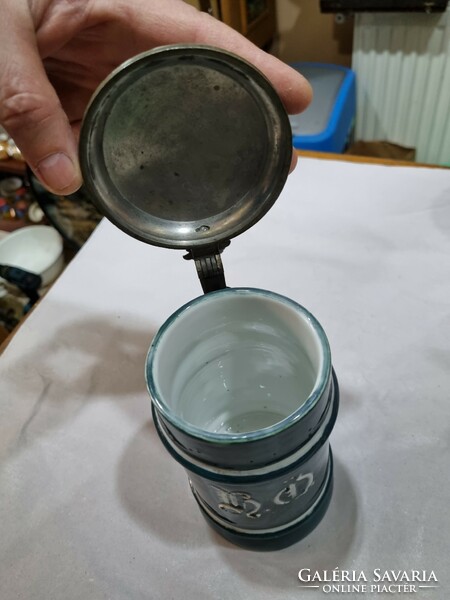 Old pewter cup with lid