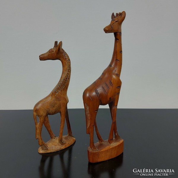 Giraffe sculpture carved from wood