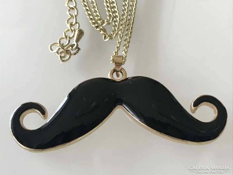 Black enamel mustache-shaped pendant on an 80 cm long chain