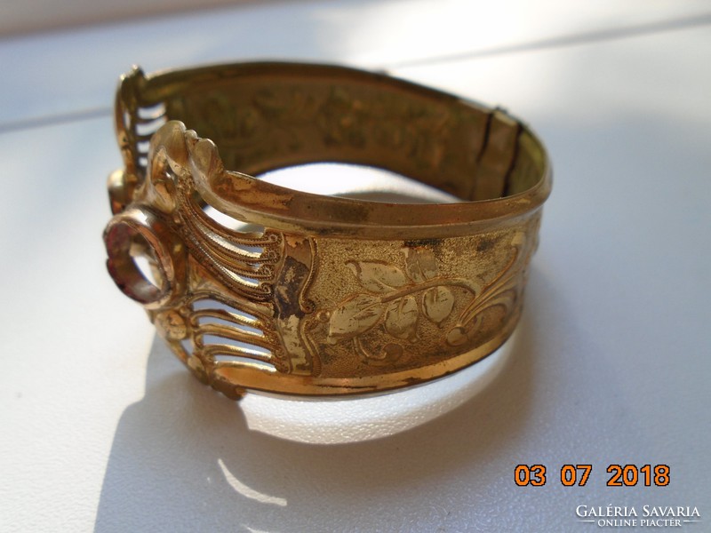 Antique fire-gilded repoussé wide bangle with delicate openwork and convex pattern