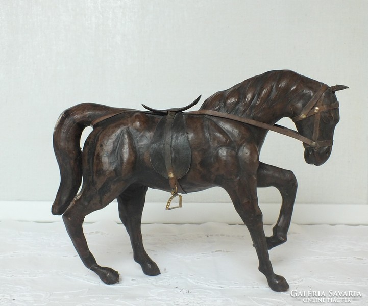 Horse statue covered in leather, leather wood