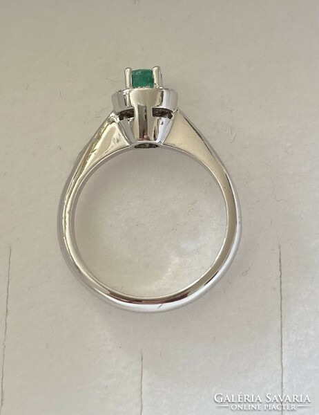 18 carat white gold ring with emeralds and diamonds!