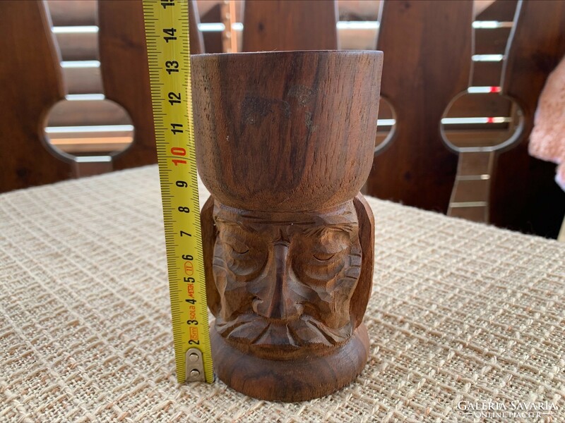 Antique carved wooden candle holder, peasant man wearing mustache