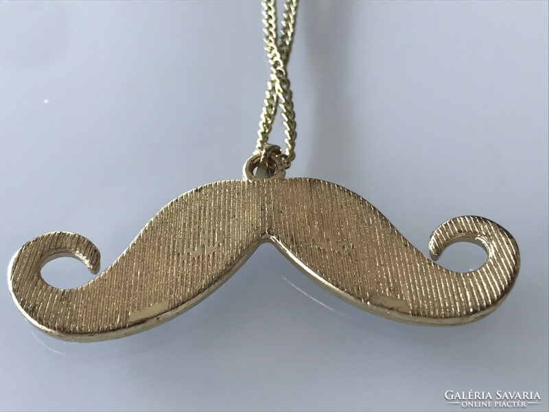 Black enamel mustache-shaped pendant on an 80 cm long chain