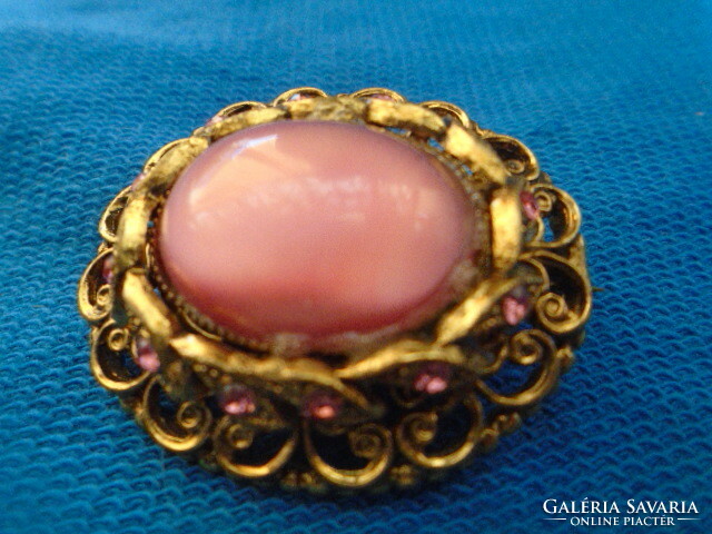 Old brooch colored half-bite to stone v. Pink to deep pink