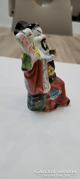 Antique Chinese or oriental porcelain statue. 10.5 cm.