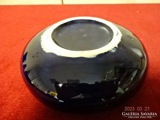 German glazed ceramic ashtray, decorated with a gold pheasant on a cobalt blue base. Jokai.