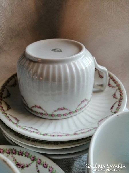 Porcelain tea cups with saucers