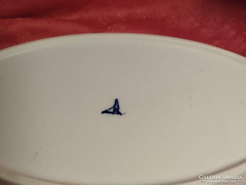 Blue striped oval porcelain serving bowl.