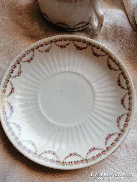 Porcelain tea cups with saucers