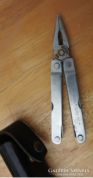 Leatherman multi knife hand tool in its original case