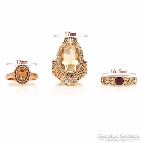 Set of 3 rings in vintage style with golden crystal stones
