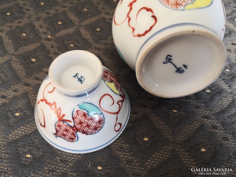 Japanese porcelain sake pourer and glass, marked